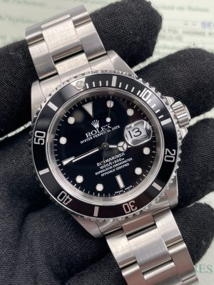 Rolex Submariner 16610 with Paper from 1999