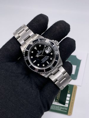 Submariner Date 16610 RRR card like new 2009 never polished