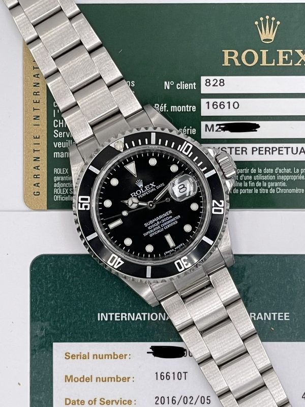 Submariner Date 16610 RRR card like new 2009 never polished